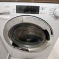 SAR 800,  Candy Washing Machine (wash/dry) 11 Kg, Wi-Fi, 1400 RPM