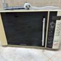 SAR 150,  Microwave Oven Kenwood MW740