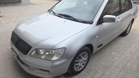Sitra, Vehicles, Cars & Trucks , BHD 760,  Mitsubishi Lancer,  2002,  Automatic,  200000 KM,  FAMILY CAR. ONE YEAR PASSED