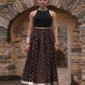 INR 915,  Buy Women's Black Multi Printed Flared Long Skirt Online