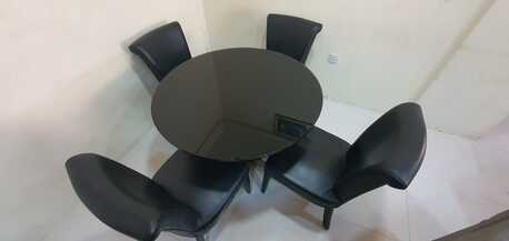Juffair, Furniture, BHD 40,  MODERN GLASS ROUND TABLE + 4 CHAIRS URGENT SALE 40 BHD Negotiable