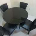 BHD 40,  MODERN GLASS ROUND TABLE + 4 CHAIRS URGENT SALE 40 BHD Negotiable
