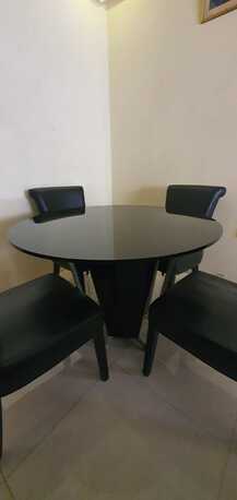 Juffair, Furniture, BHD 40,  MODERN GLASS ROUND TABLE + 4 CHAIRS URGENT SALE 40 BHD Negotiable