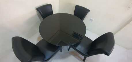 Juffair, Furniture, BHD 40,  MODERN GLASS ROUND TABLE + 4 CHAIRS URGENT SALE 40 BHD Negotiable