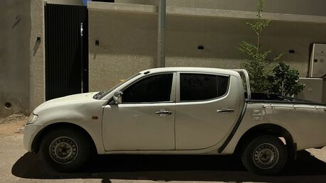 Riyadh, Vehicles, Cars & Trucks , 2009,  2009,  Automatic,  10000 KM,  Mitsubishi  Diesel Pickup L200 Fast And Istemara New Buy And Drive