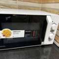 SAR 150,  Microwave Oven And Iron Stand