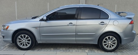 Zallaq, Vehicles, Cars & Trucks , BHD 1700,  Mitsubishi Lancer 2014 Sports Shape Well Maintained 2.0L,  2014,  Automatic,  200000 KM,  Mitsubishi Lancer  Shark Shape 2.0 Perfect Condition Passing Until Sept 2026.