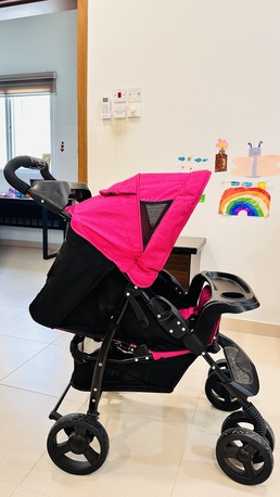 Tubli, Baby & Kid Stuff, BHD 17,  Juniors Baby Stroller (Excellent Condition) &ndash; Vibrant Pink! BD 17