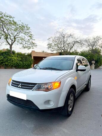 Manama, Vehicles, Cars & Trucks , BHD 1400,  Mitsubishi Outlander,  2009,  Automatic,  180000 KM,   FOR SALE (FAMILY USED CAR )
