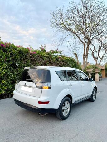 Manama, Vehicles, Cars & Trucks , BHD 1400,  Mitsubishi Outlander,  2009,  Automatic,  180000 KM,   FOR SALE (FAMILY USED CAR )