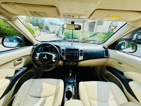 Manama, Vehicles, Cars & Trucks , BHD 1400,  Mitsubishi Outlander,  2009,  Automatic,  180000 KM,   FOR SALE (FAMILY USED CAR )