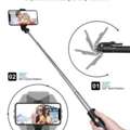 AED 20,  Portable 27-inch Mobile Phone Tripod Stand With Wireless Remote Control And Extendable Tri