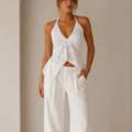 INR 980,  Bubbly White Schiffli Halter Neck Top