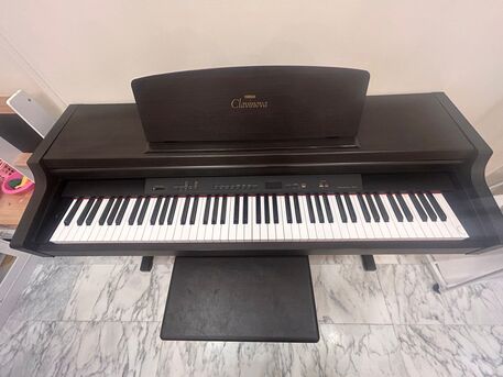 Saar, Musical Instruments, BHD 200,  Excellent Condition = Yamaha Clavinova CLP-411 Digital Piano With Stool