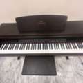 BHD 200, Excellent Condition = Yamaha Clavinova CLP-411 Digital Piano With Stool