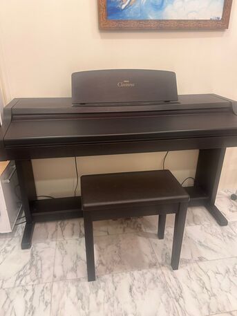 Saar, Musical Instruments, BHD 200,  Excellent Condition = Yamaha Clavinova CLP-411 Digital Piano With Stool