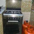 INR 600,  Cooking Gas + 2 Cylinders