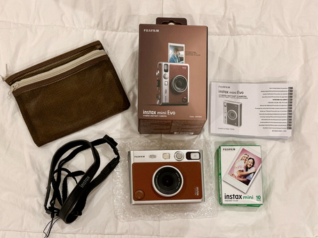 Manama, Electronics, BHD 75,  Fujifilm Instax Mini Evo Hybrid Instant Camera (BROWN) With Free Instax Film Mini 10 Sheet