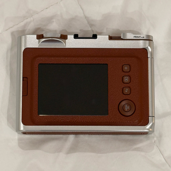 Manama, Electronics, BHD 75,  Fujifilm Instax Mini Evo Hybrid Instant Camera (BROWN) With Free Instax Film Mini 10 Sheet