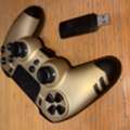 SAR 200,  Steelplay Wireless Controller For PS4/PS5 - Like New (Gold)