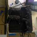 SAR 1300,  PS4 With 4 Joystick Original Sony And 2 Games FIFA 25 And NFS