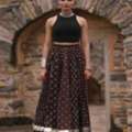 INR 915,  Buy Women's Black Multi Printed Flared Long Skirt Online