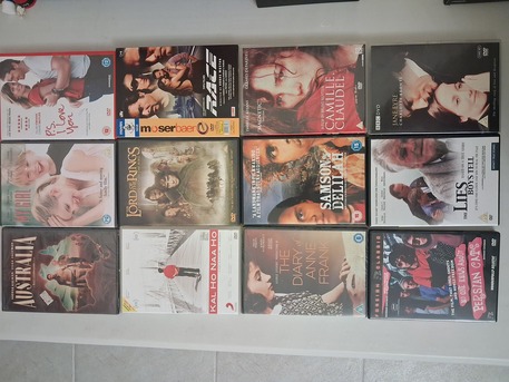 Adliya, Photo & Video, BHD 6,  12 DVD - Assorted Movies ( Some Unopened)