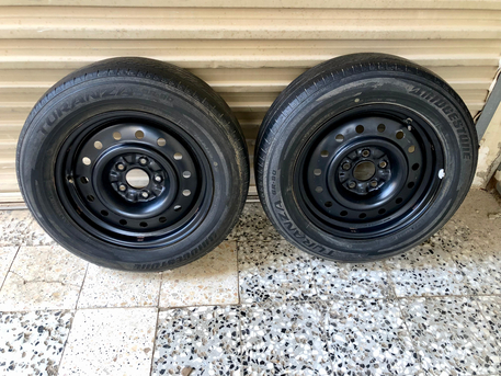 Riyadh, Auto Parts, SAR 180,  2 Nissan OEM Steel Rims With Brigistone Tires