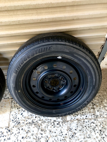 Riyadh, Auto Parts, SAR 180,  2 Nissan OEM Steel Rims With Brigistone Tires