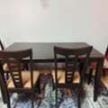 SAR 200,  Solid Wood Dining Table + 4 Chairs (Dark Brown) &ndash; 200 SAR