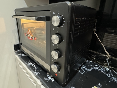 Riyadh, Appliances, SAR 350,  New Electric Oven Nikai 65 Liter 2200W Rotisserie Convection Keep Warm 2 Years Warranty