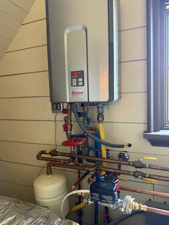 New York, Construction, Expert Installing A Tankless Water Heater For Energy-Efficient Hot Water