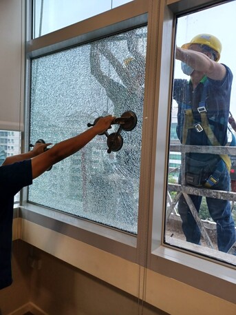 Manama, Construction, High Rise Building Facade Broken Glass Replacing Work With Cradle Service