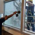 High Rise Building Facade Broken Glass Replacing Work With Cradle Service