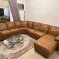 SAR 1500, Brown Genuine Leather Sectional Sofa From US With minor Scratch + Table