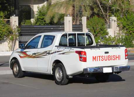 Manama, Vehicles, Cars & Trucks , BHD 3400,  Mitsubishi L 200,  2018,  Automatic,  155000 KM,  MITSUBISHI L200  MODEL FOR URGENT SALE