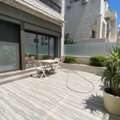 JOD 15000/year,  2 BR,  Elegant Ground-Floor Living In Abdoun