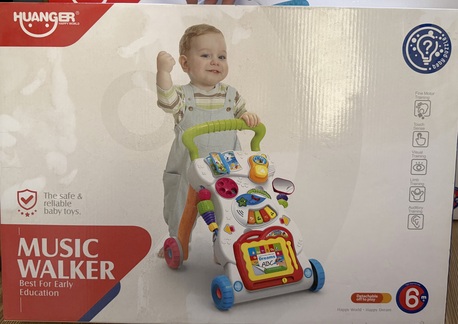 Al Malaz, Baby & Kid Stuff, SAR 150,  Huanger 2 In 1 Walker And Active Table And Huanger Music Walker