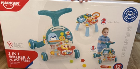 Al Malaz, Baby & Kid Stuff, SAR 150,  Huanger 2 In 1 Walker And Active Table And Huanger Music Walker