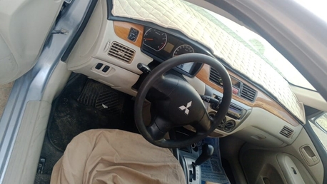 Manama, Vehicles, Cars & Trucks , BHD 1300,  Mitsubishi Lancer,  2012,  Automatic,  240000 KM,   Passing Insurance 31-3-2027 Engine 1.6