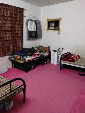 Al Wizarat, Bedspace For Rent, Room Sharing  Available In Well-Maintained Flat. Free Water & Electricity