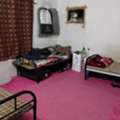 Room Sharing  Available In Well-Maintained Flat. Free Water & Electricity