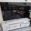 SAR 2100,  Sale 65 Inch Haier LED Smart TV & Modern TV Stand & LG Sound System 5.1 Music Channel
