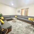 SAR 650,  U‑Shaped Sofa (Grey)