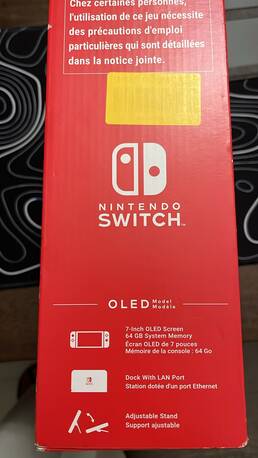 Abraq Ul Raghama, Video Games, SAR 1250,  Nintendo Switch OLED White Edition + Zelda + Rayman + Case &ndash; Excellent Condition
