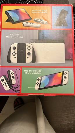 Abraq Ul Raghama, Video Games, SAR 1250,  Nintendo Switch OLED White Edition + Zelda + Rayman + Case &ndash; Excellent Condition