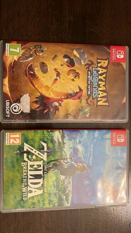 Abraq Ul Raghama, Video Games, SAR 1250,  Nintendo Switch OLED White Edition + Zelda + Rayman + Case &ndash; Excellent Condition