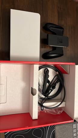 Abraq Ul Raghama, Video Games, SAR 1250,  Nintendo Switch OLED White Edition + Zelda + Rayman + Case &ndash; Excellent Condition