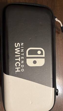 Abraq Ul Raghama, Video Games, SAR 1250,  Nintendo Switch OLED White Edition + Zelda + Rayman + Case &ndash; Excellent Condition
