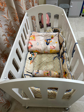 Khobar, Baby & Kid Stuff, SAR 450,  White Wooden Baby Cot / Toddler Bed Bundle (Includes 2 Mattresses + Full Bedding Set).